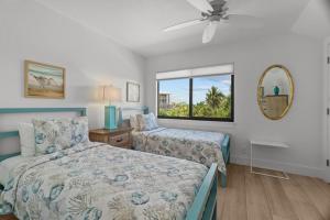 Ένα ή περισσότερα κρεβάτια σε δωμάτιο στο Seagrape Village 2 +40 φωτογραφίες