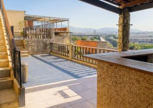 a balcony of a house with a view at Apartamentos Porto Maravilha in Rio de Janeiro