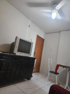 Televisyen dan/atau pusat hiburan di Apartamento no Centro