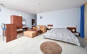 Postel nebo postele na pokoji v ubytování Family Hotel Regata