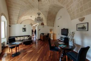 Posezení v ubytování Alla dimora di Chiara Suite and Rooms
