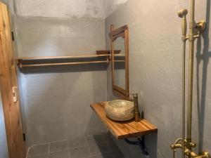 a bathroom with a sink and a mirror at Pác Bó Boutique Hotel in Cao Bằng +18 photos