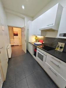 Kuchyň nebo kuchyňský kout v ubytování ABAI Dormitory