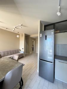 Η κουζίνα ή μικρή κουζίνα στο Modern City View Apartment in Prime Location +10 φωτογραφίες