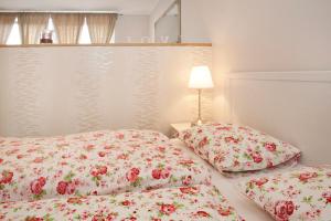 Posteľ alebo postele v izbe v ubytovaní Aurora Apartment Danube View