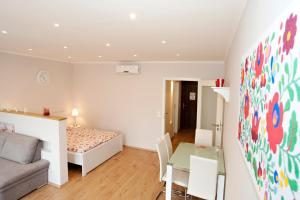 Posteľ alebo postele v izbe v ubytovaní Aurora Apartment Danube View