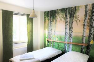 Voodi või voodid majutusasutuse Svefi Vandrarhem - Hostel toas
