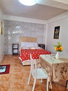 Posezení v ubytování L2 Cozy Family Apartment Room Walk to Damosa Gateway Near SM, SPMC, Airport