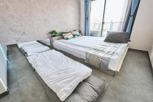 Кровать или кровати в номере Cyber Shinjyuku Tokyo Room +33 фотографии