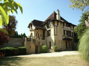 an old stone house with a turret at Elegant Mansion Stay in Belvès in Belvès +32 photos