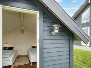 aterior view of a shed with two beds at 18 person holiday home in Harboøre in Harboør