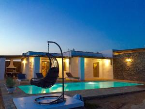 Bazén v ubytovaní Paros Afrodite Luxury Villas alebo v jeho blízkosti