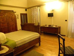 TV a/nebo společenská místnost v ubytování B&B Il Mulino + 17 fotografií