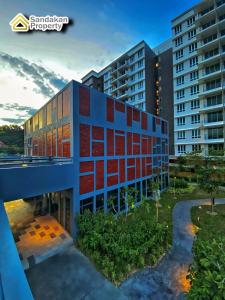 a rendering of a building with red bricks at Sri Indah The Eleventh 5pax in Sandakan