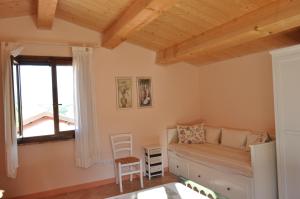 Voodi või voodid majutusasutuse Il Granaio di Colle Vichinano toas