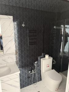 Ένα μπάνιο στο Green City Resort