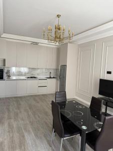 Η κουζίνα ή μικρή κουζίνα στο Green City Resort