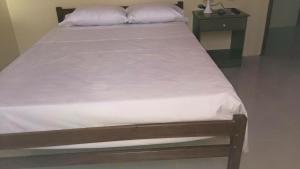 Letto o letti in una camera di Hostal Montecarlos