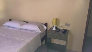 Letto o letti in una camera di Hostal Montecarlos