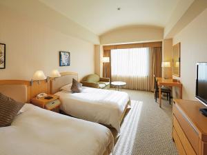 TV a/nebo společenská místnost v ubytování Royal Pines Hotel Urawa