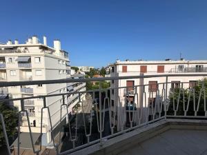 a view of buildings from a balcony of a building at Bright 1Bedroom Apartment, Steps to Juan les Pins Beach in Antibes