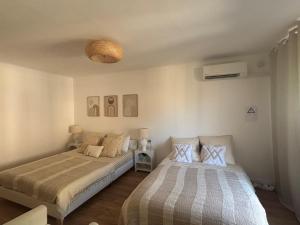 Postel nebo postele na pokoji v ubytování Spacieux studio proche gare