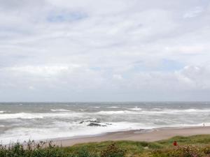 a view of the ocean from a beach at 6 person holiday home in Lemvig-By Traum in Trans