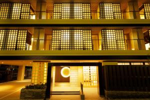a building with a moon projected on the door at Tsukino Yado Sara in Hakone