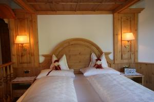Voodi või voodid majutusasutuse Hotel Al Sonnenhof toas