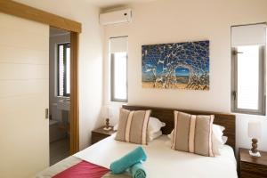 Кровать или кровати в номере Cap Ouest by Horizon Holidays