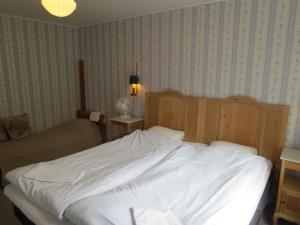 Postel nebo postele na pokoji v ubytování ÖlandsRo B&B
