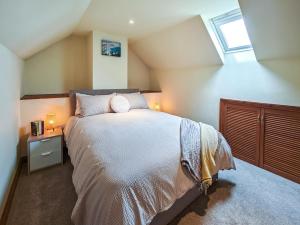 Ένα ή περισσότερα κρεβάτια σε δωμάτιο στο 4 Bed in Alswear oc-p32729