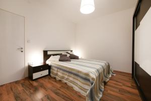 Postel nebo postele na pokoji v ubytování Apartment Becca