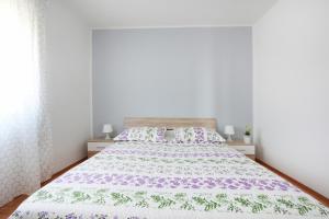 Postel nebo postele na pokoji v ubytování Apartment Becca