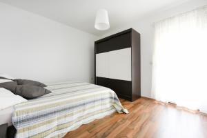 Postel nebo postele na pokoji v ubytování Apartment Becca