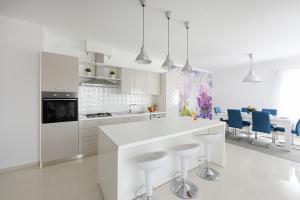 Kuchyň nebo kuchyňský kout v ubytování Apartment Becca