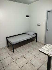 En eller flere senge i et værelse på Apto 8 ótimo local próximo Shopping