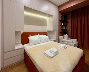 Postel nebo postele na pokoji v ubytování Siena Suite Tsaghkadzor