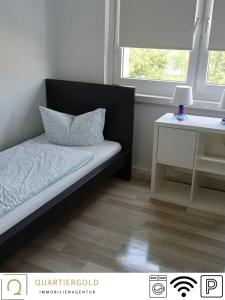 Ένα ή περισσότερα κρεβάτια σε δωμάτιο στο Weinbergstraße 48, 3. OG links, Lauchhammer