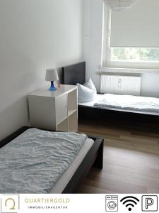 Ένα ή περισσότερα κρεβάτια σε δωμάτιο στο Weinbergstraße 48, 3. OG links, Lauchhammer