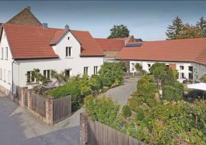 an aerial view of a house with red roofs at Apartment in Lampertheim-Hofheim in Lampertheim