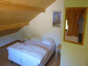 a bedroom with two beds in a room at Chalet in Saint-Jean near Ski Lift in Saint-Jean-d'Aulps