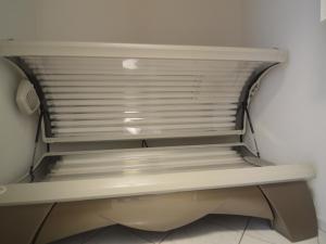 a white shelf in a room with a window at Villa in Lunteren with Heated Pool in Lunteren