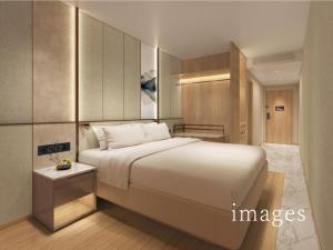 En eller flere senge i et værelse på Heian No Mori Kyoto