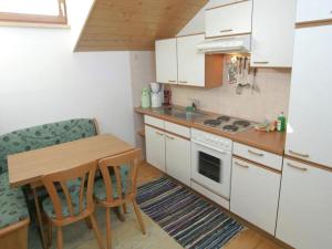 Η κουζίνα ή μικρή κουζίνα στο Apartment in Zauchensee near Ski Bus