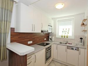 Η κουζίνα ή μικρή κουζίνα στο Modern Apartment in Fiss at Ski Bus Stop +42 φωτογραφίες