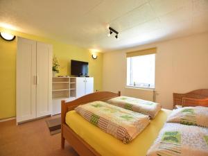 Ένα ή περισσότερα κρεβάτια σε δωμάτιο στο Comfortable Apartment near Insel Poel +39 φωτογραφίες