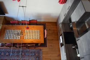 an overhead view of a table with a chessboard at Chalet Salzburg, Dienten in Dienten am Hochkönig +14 photos
