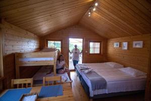 Postel nebo postele na pokoji v ubytování Bungalow in Miedzyzdroje with a terrace