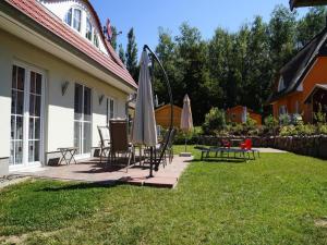 Zahrada ubytování Holiday House Nightingale, Glowe
